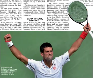  ??  ?? Serbia’s Novak Djokovic celebrates a point against Philipp Kohlschrei­ber of Germany. —