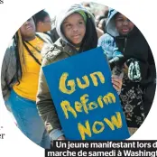  ??  ?? Un jeune manifestan­t lors de la marche de samedi à Washington.