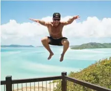  ?? GLOBAL DEGREE ?? Global Degree founder Michael Graziano takes to the air at Airlie Beach in Queensland, Australia. He and his friends want to explore the whole world.