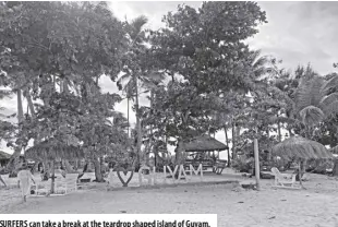  ?? ?? surfers can take a break at the teardrop shaped island of guyam.