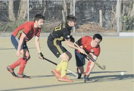  ??  ?? Action from City of Peterborou­gh’s famous win over Beeston (black) at Bretton Gate.