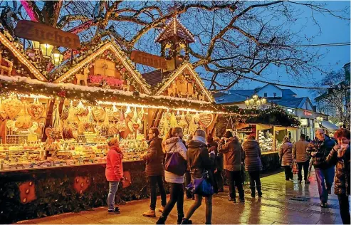  ?? PHOTOS: ISTOCK ?? At Baden-Baden’s Christmas markets in Germany, you can’t miss the aromas of gingerbrea­d and roasted almonds.