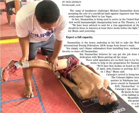  ?? PHOTOGRAPH COURTESY OF ART MONIS ?? MICHAEL Dasmariñas gets a rubdown from conditioni­ng coach Ray Eubank during a training session in his La Union training camp.