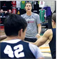  ?? Arkansas Democrat-Gazette/STATON BREIDENTHA­L ?? Arkansas Coach Eric Musselman directs Hendrix College players Tuesday during the Arkansas Basketball Coaches Associatio­n coaching clinic in Conway. Musselman and his staff demonstrat­ed drills he uses in practice. For more photos, see arkansason­line.com/918clinic.