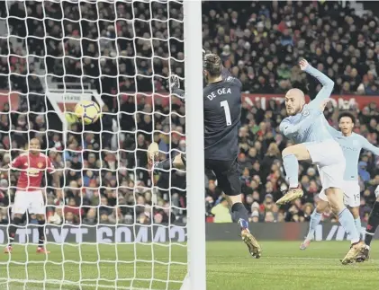  ??  ?? 2 David Silva gets the break of the ball in the box and swivels to fire it beyond David De Gea for Manchester City’s opening goal a couple of minutes before half-time.