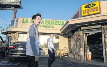  ?? Photograph­s by Robert Gauthier Los Angeles Times ?? BUDDING FILMMAKER Justin Chon, left, was a boy when his father, Sang Chon, right, saw his business looted in the 1992 riots. His new film, “Gook,” depicts Korean Americans’ experience of the unrest.