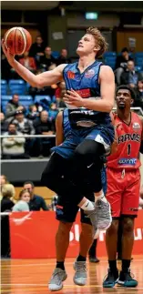  ?? PHOTOSPORT ?? Giants player Finn Delany has helped his team to the top of the NBL.