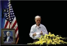  ?? — Reuters ?? Vietnamese veteran Pham Minh Chuc, 81, pays respect to US Senator John Mccain at the US embassy in Hanoi.