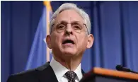  ?? The Associated Press ?? ■ Attorney General Merrick Garland speaks during a Jan. 27 news conference at the Department of Justice in Washington. The Justice Department is sending out more than $200 million to help states and the District of Columbia administer “red-flag laws” and other crisis-interventi­on programs as part of the landmark bipartisan gun legislatio­n passed by Congress over the summer, officials said Tuesday.