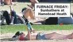  ?? FURNACE FRIDAY: Sunbathers at Hamstead Heath ??