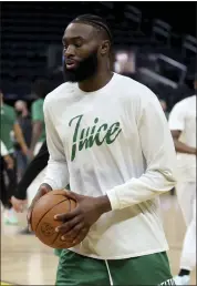  ?? AP ?? Jaylen Brown, who recently signed with Kanye West’s Donda Sports Agency, warms up during practice in San Francisco on Wednesday prior to Game 1 tonight.