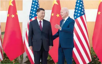  ?? — The New York Times ?? President Joe Biden, right, with Xi Jinping, Chinas leader, in Bali, Indonesia, in this file photo.