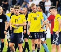  ??  ?? SAD END Forrest, McBurnie and Tierney at Haifa final whistle