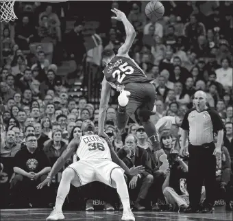  ?? WINSLOW TOWNSON/AP PHOTO ?? Philadelph­ia’s Ben Simmons runs into Boston’s Marcus Smart and draws a foul by Smart during the third quarter of Thursday’s game at TD Garden. Boston won, 108-97.