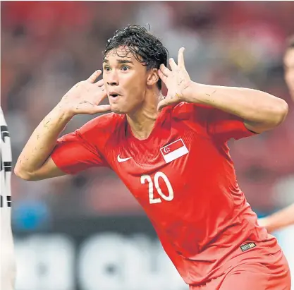 ??  ?? Singapore’s Ikhsan Fandi celebrates after scoring a goal against Timor Leste.