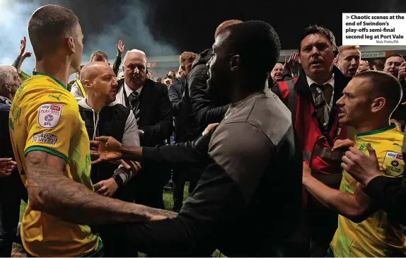  ?? Nick Potts/PA ?? Chaotic scenes at the end of Swindon’s play-offs semi-final second leg at Port Vale