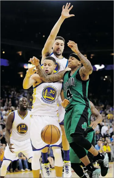  ??  ?? The Celtics found a way to hand Stephen Curry, Klay Thompson and the Golden State Warriors their first home loss of the season on Friday.
