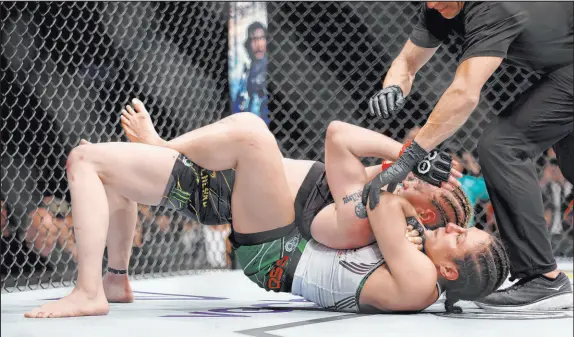  ?? ?? Alexa Grasso submits Valentina Shevchenko in the fourth round to pull off a shocking upset in their women’s flyweight title bout.