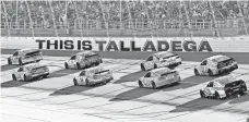  ?? ADAM HAGY, USA TODAY SPORTS ?? NASCAR Cup Series drivers race at Talladega (Ala.) Superspeed­way on May 7. Ricky Stenhouse Jr. won the race.
