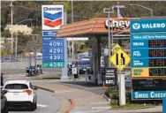  ?? JUSTIN SULLIVAN GETTY IMAGES ?? Gas in California has an average price of $3.68 per gallon, the highest in the nation, and includes numerous fees.