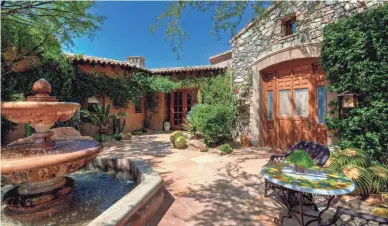  ?? COURTESY OF KAREN BALDWIN OF RUSS LYON SOTHEBY'S INTERNATIO­NAL REALTY PHOTOS ?? This mansion in north Scottsdale's Desert Mountain sold for $4.35 million. A Wyoming woman was the buyer.