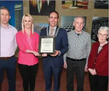  ??  ?? Mayor Hurley making a presentati­on to the Kilmurry Historical Associatio­n group of Aidan O’Sullivan, Louise Daly and Anthony and Mary O’Sullivan.