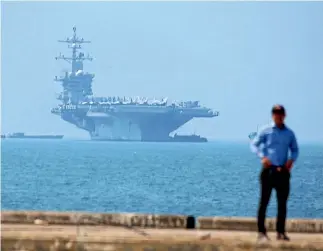  ?? PHOTO: AP ?? The USS Carl Vinson is anchored at Tien Sa Port in Danang - the first visit to a Vietnamese port by a United States Navy aircraft carrier since the Vietnam War.