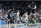  ?? Photograph: Dylan Buell/Getty Images ?? It took more than three decades from when the current 64-team format was introduced until a No 16 seed finally beat a No 1. Now it’s happened twice in five years, after Fairleigh Dickinson stunned Purdue on Friday.