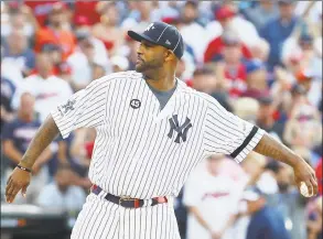  ?? Gregory Shamus / Getty Images ?? Yankees pitcher CC Sabathia throws out the ceremonial first pitch during MLB AllStar Game at Progressiv­e Field on Tuesday in Cleveland.