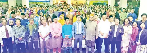  ??  ?? Junz (front, seventh left) and Daud (front, sixth left) with MAFI heads and staff during its 2018 Hari Raya celebratio­n at Wisma Pertanian yesterday.