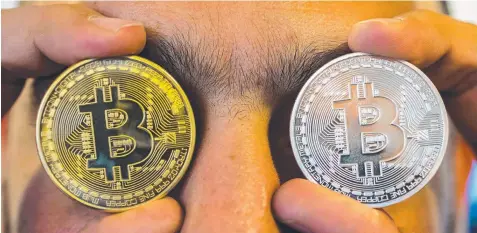  ?? Picture: AFP ?? MAN’S GAME: Bitcoin traders in Australia tend to be male, with tech-savvy 18-to-29-year-olds dominant.
