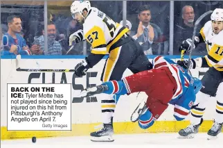  ?? Getty Images ?? BACK ON THE
ICE: Tyler Motte has not played since being injured on this hit from Pittsburgh’s Anthony Angello on April 7.