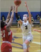  ?? AUSTIN HERTZOG - MEDIANEWS GROUP ?? Spring-Ford’s Lucy Olsen drives and shoots over Plymouth Whitemarsh’s Deja Evans during the District 1-6A final.