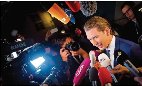  ?? FOTO: SEMICEK/AFP ?? Mann des Abends: Österreich­s Außenminis­ter Sebastian Kurz gewann mit der ÖVP die Wahl und könnte nächster Kanzler werden, mit 31 Jahren.