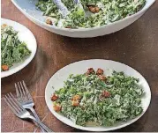  ?? KITCHEN/AP] [PHOTO BY JOE KELLER, AMERICA’S TEST ?? This kale Caesar salad recipe appears in the cookbook “Nutritious Delicious.”