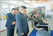  ?? AFP ?? Undated picture released by KCNA of Kim JongUn visiting the Chemical Material Institute of the Academy of Defence Science.