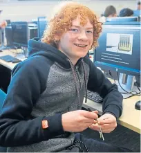  ?? Pictures: Dougie Nicolson. ?? Pupils busy at the workshop, including, top, Monifieth youngsters Leah McLeod, left, and Keraleigh Simpson, and Geordie Harrow, from Madras College, above right, and fourth year Ethical Hacking student Michael Kleinman working with Ben Bowman.