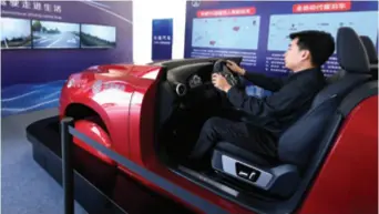  ??  ?? Autonomous driving technology is demonstrat­ed at the China Internatio­nal Digital Economy Expo