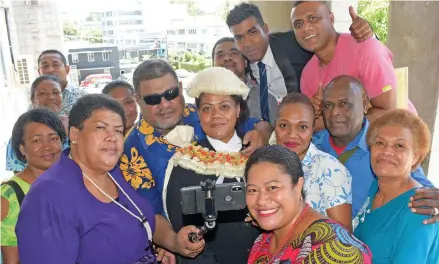  ?? Photo: Ronald Kumar ?? Ana Waqatabu (middle) with her family after being admitted to the Bar by Acting Chief Justice Kamal Kumar on February 27, 2020.