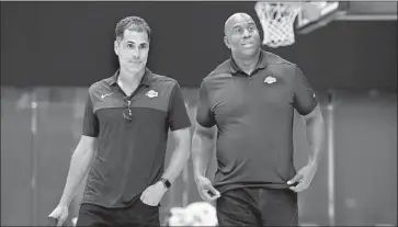  ?? Wally Skalij Los Angeles Times ?? LAKERS GENERAL MANAGER Rob Pelinka, left, and Magic Johnson, the president of basketball operations, say they were looking for competitiv­e players to complement LeBron James during the offseason.