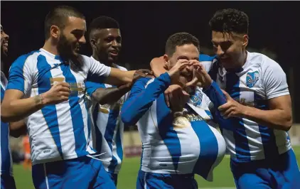  ??  ?? Tarxien Rainbows' Andre' Scicluna celebrates scoring the first for his team against Lija Athletic. Photo: James Galea