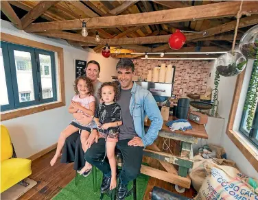  ?? SIMON O’CONNOR/STUFF ?? Adrianna Greenhill and Tane Morgan provide coffee from their home, which they share with twins Indigo, left, and Knox, 3.