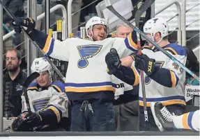  ?? STAN SZETO/USA TODAY SPORTS ?? Center Brayden Schenn celebrates after the Blues scored their fifth goal against the Sharks on Sunday.