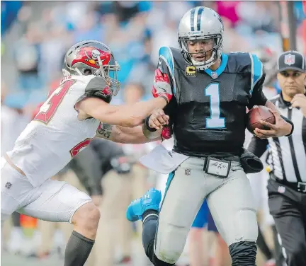  ?? BOB LEVERONE/THE ASSOCIATED PRESS FILES ?? Carolina quarterbac­k Cam Newton has the chance to pull off a rare feat for the second time in his career — lead his team in rushing on the season. Newton finished the 2012 season leading the Panthers in rushing yards.