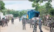  ??  ?? CRPF personnel standing guard at national highway near AssamMizor­am border on August 1 after violent clashes.