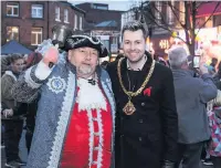  ??  ?? Town crier Tony Parsons and Mayor Adam Schofield join in festivitie­s