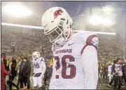  ?? NWA Democrat-Gazette/BEN GOFF ?? Senior defensive back Ryder Lucas leaves the field after Arkansas’ loss Friday. The Razorbacks end the season at 2-10, a school record for most losses.