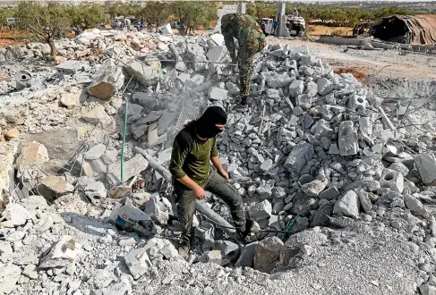  ?? AP ?? The remains of a home destroyed near the village of Barisha after the US operation to kill Baghdadi.