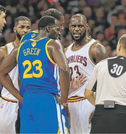  ?? | RONALDMART­INEZ/ GETTY IMAGES ?? Draymond Green and Kevin Durant got into some squabbles with LeBron James in Game 4.