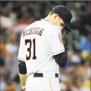  ?? Eric Christian Smith / Getty Images ?? Colin McHugh of the Houston Astros wipes his brow after loading the bases during the fifth inning against the San Francisco Giants at Minute Maid Park on May 12, 2015 in Houston. McHugh has expressed regret of not stopping the Astros’ sign-stealing scheme after signing with the Boston Red Sox.